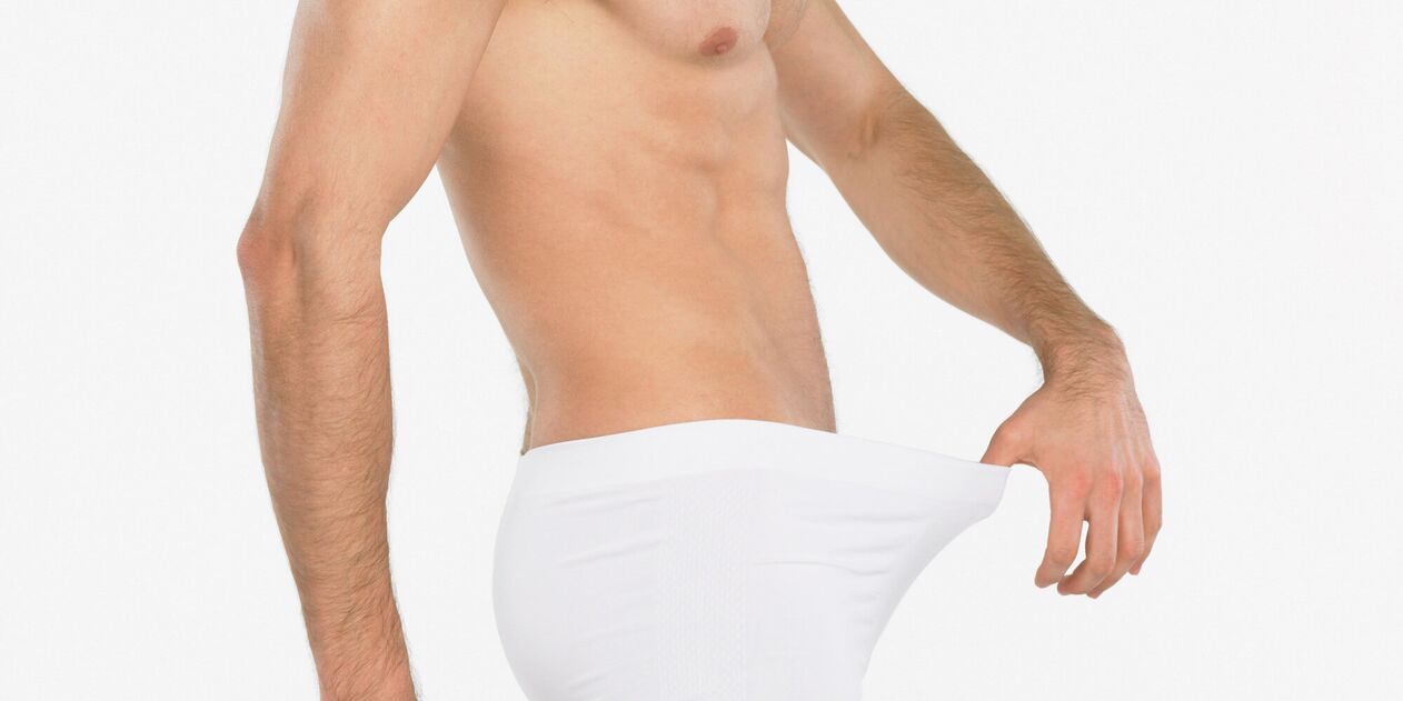 Vyras galvoja apie varpos padidėjimą masažu